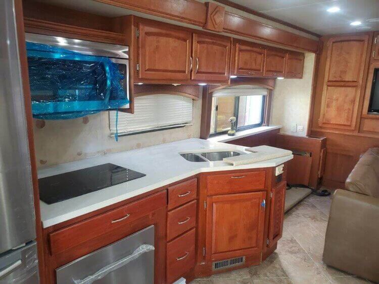 custom cabinets and upholstery work on a set of damaged cabinets done by rv masters in Kenner, La.